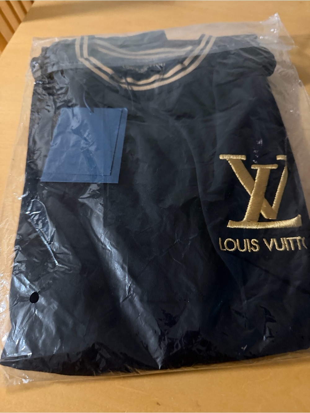 Louis Vuitton Black T-Shirt with Gold LV Logo and Striped Trim - Picture 4 of 4